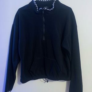 Black pullover with zip & checkered trim